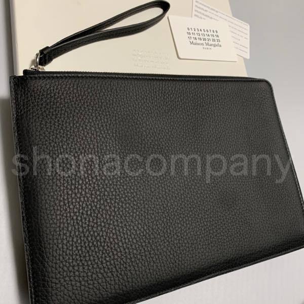 人気!【Maison Margiela】Snatched クラッチバッグ L Maison Margiela Snatched Leather Clutch Bag | Black | FARFETCH