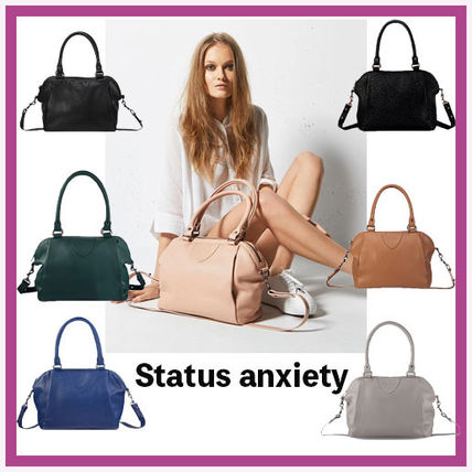 STATUS ANXIETY Handbags Collaboration Plain Handbags