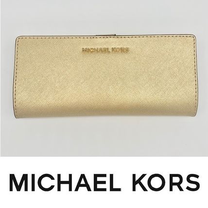 Michael Kors 長財布 マイケルコース Jet Set Travelフラップスリム長財布 ゴールド