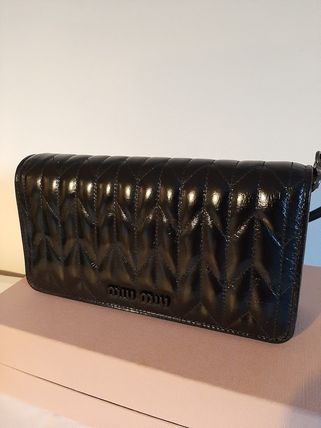 MiuMiu x クラッチバッグ(レディース)|新作を海外通販【BUYMA】