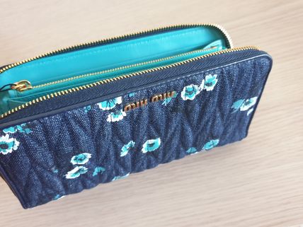 ネイビー(紺)系 MiuMiu x 長財布(レディース) - 海外通販のBUYMA