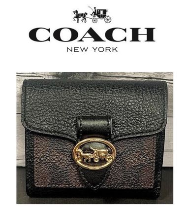 新品未使用★COACH折り財布 シグネチャー エンボス ブラック