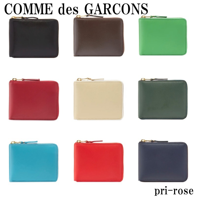 【関税.送料込】COMME des GARCONS/レザー 二つ折り 財布