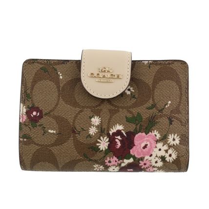 コーチCOACH最新作二つ折りミニ財布♡花柄フラワー×シグネチャーフローラル