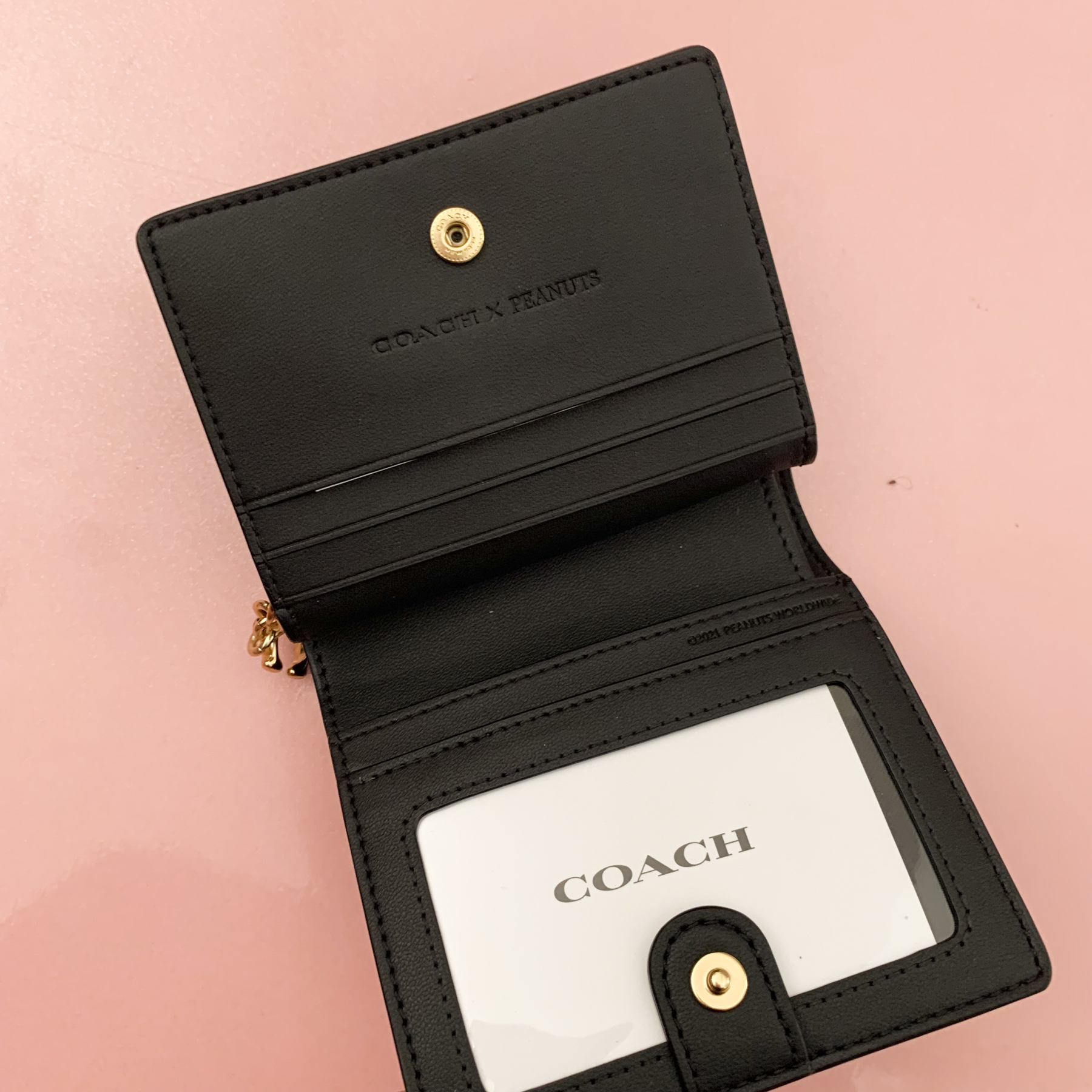 COACH x スヌーピー】○完売レア♪○PEANUTS お財布 スナップ