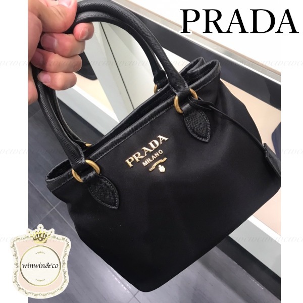 PRADA【国内発/関税込】ナイロン レザーのハンドバッグ