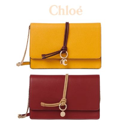 Chloe ALPHABET x クラッチバッグ(レディース) - 海外通販のBUYMA