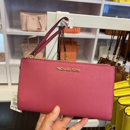 Michael Kors JET SET TRAVEL x 折りたたみ財布(レディース)|新作を ...