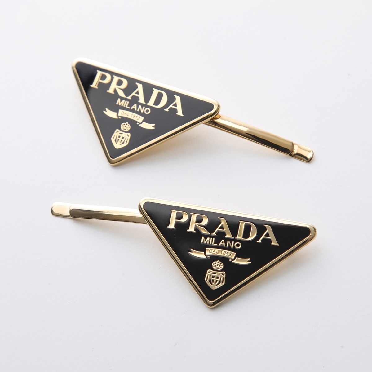 PRADA ヘアピン 1IF051 2BA6 ヘアクリップ トライアングルロゴ