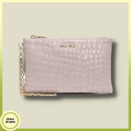 MiuMiu x クラッチバッグ(レディース)|新作を海外通販【BUYMA】