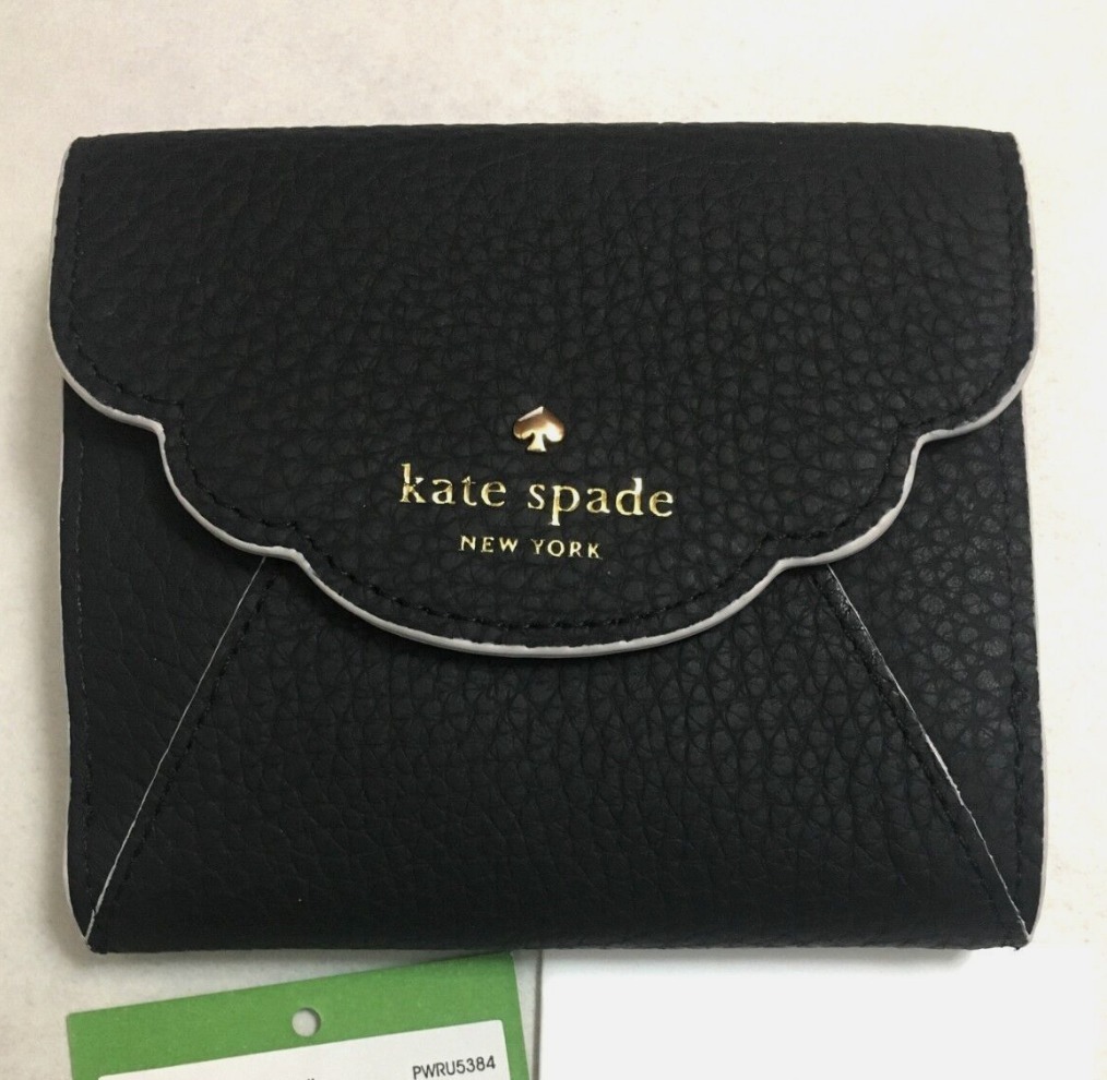 セール☆kate spade Leewood Place Tavyレザー二つ折り財布