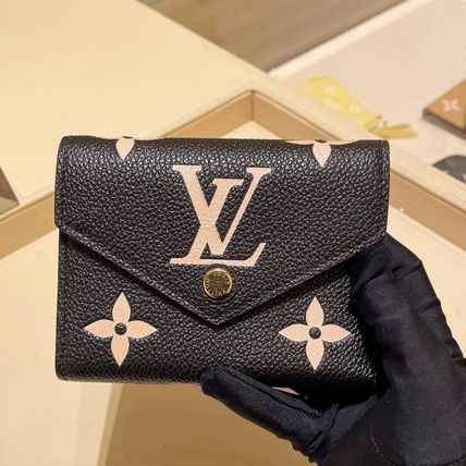 Shop Louis Vuitton MONOGRAM EMPREINTE Victorine wallet (M64060) by MUTIARA