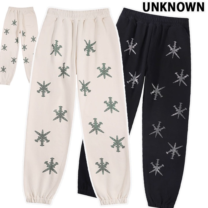 ユニセックス UNKNOWN アンノウン Dagger Rhinestone Joggers
