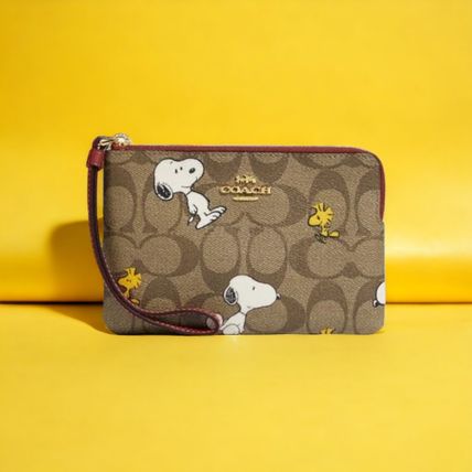 Coach Pouches & Cosmetic Bags Unisex Collaboration Logo Pouches & Cosmetic Bags