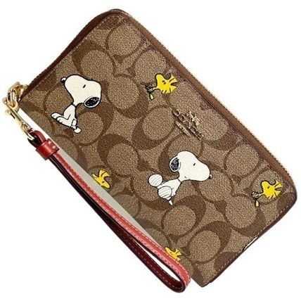 スヌーピー Coach(コーチ) - 海外通販のBUYMA