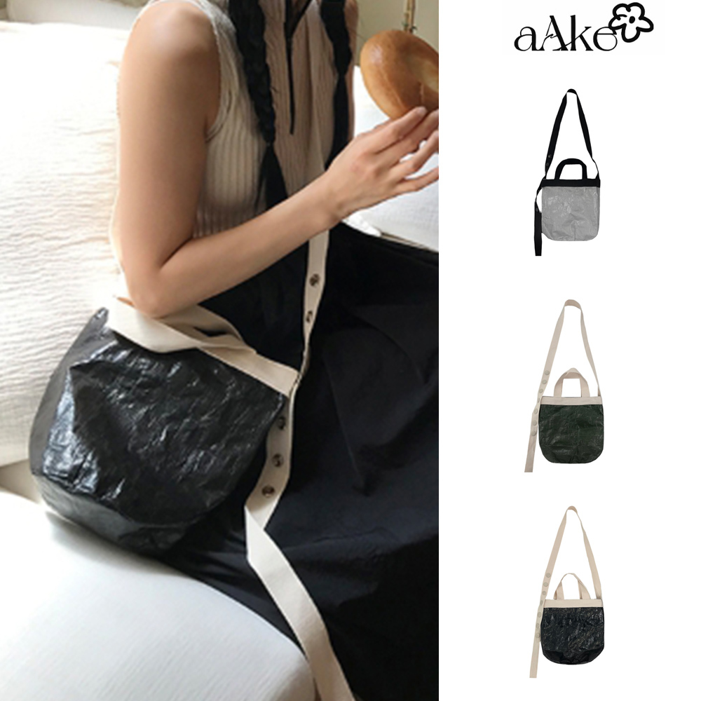 【AAKE】CYLINDRICAL NYLON BUTTON BAG