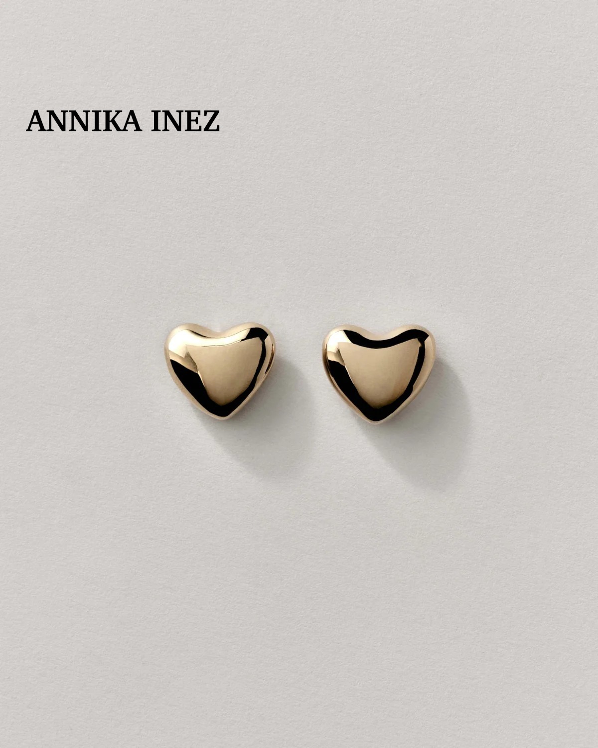 送料無料！【ANNIKA INEZ】ゴールドハートピアス