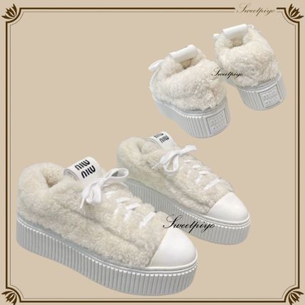 MiuMiu Platform & Wedge Shearling Sneakers