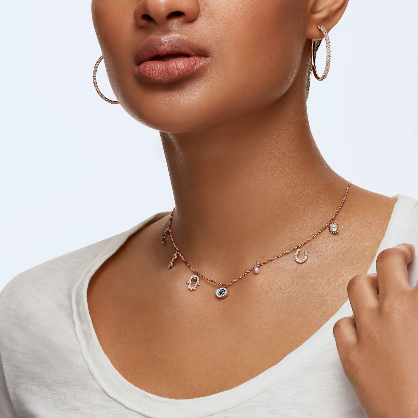 SWAROVSKIスワロフスキー Stone フープピアス 追跡送料関税込