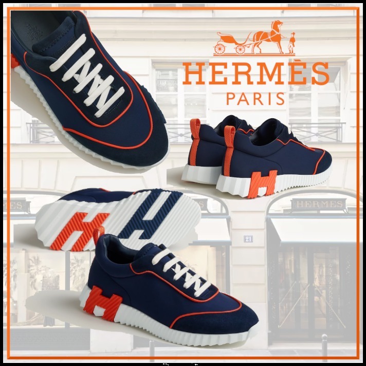 オレンジパイピングが効いてるHermesバウンシング スニーカー