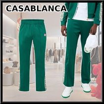 Casablanca ストレート トラックパンツ Central cee Casablanca ベロア トラックパンツ | グリーン | FARFETCH JP