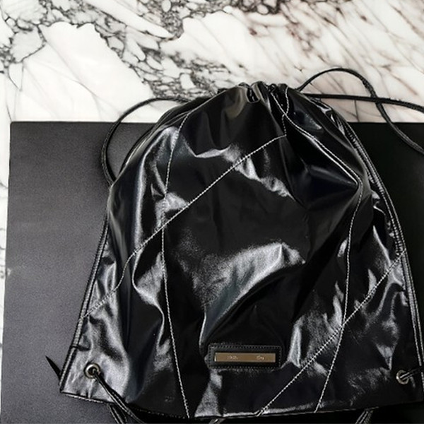 【Matin Kim】マーティンキム String Coating Backpack
