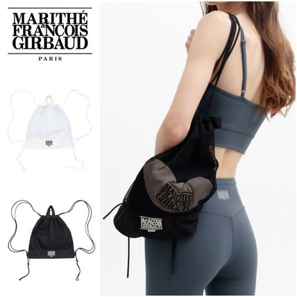 25SS新作【MARITHE】CIRCLE LOGO BUCKET BACKPACK★2色 Marithe + Francois Girbaud(マリテフランソワジルボー) バック