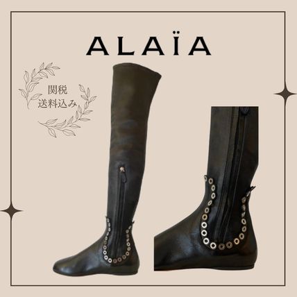 ALAIA(アライア) ロングブーツ(レディース) - 海外通販のBUYMA