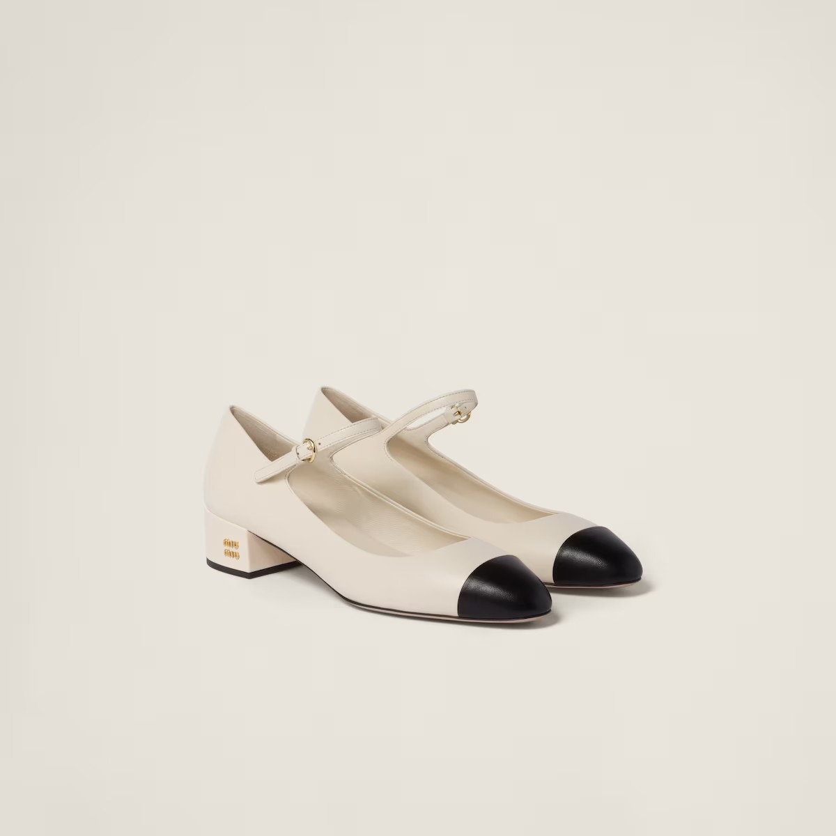 《送料無料》 MIU MIU Two-tone leather pumps