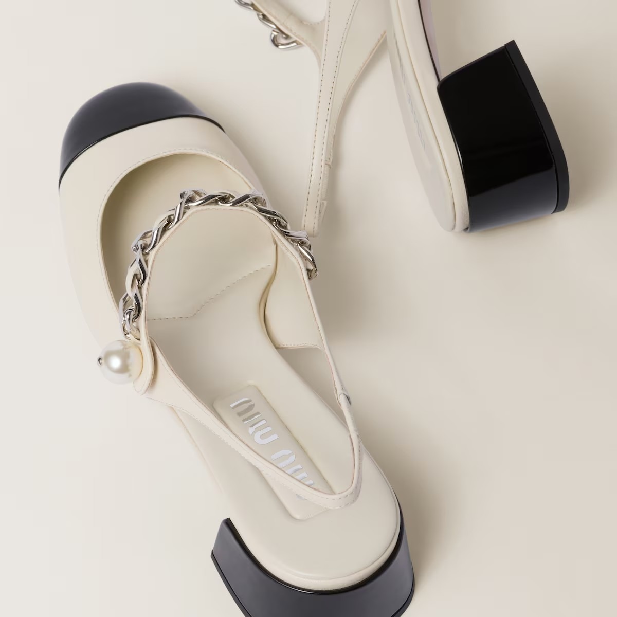 《送料無料》 MIU MIU Leather and patent slingback pumps