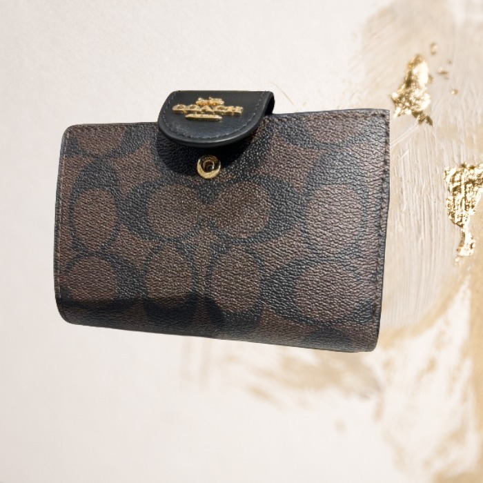 【即売 Coach(コーチ)ミディアムコーナージップ二つ折り財布】