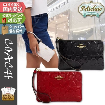 希少☆赤エンボスシグネチャー【COACH】リストレット ミニポーチ リストレット レッド（赤）系 Coach(コーチ) - 海外通販のBUYMA