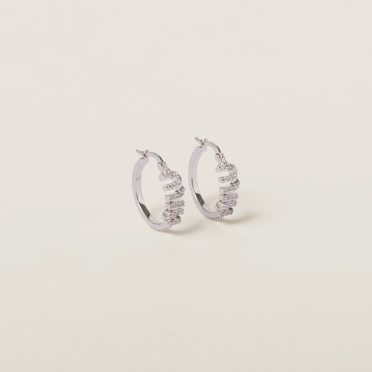 直営店】MiuMiu クリスタル付 メタルピアス