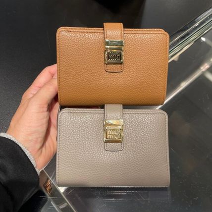 二つ折り MiuMiu(ミュウミュウ) 折りたたみ財布(レディース