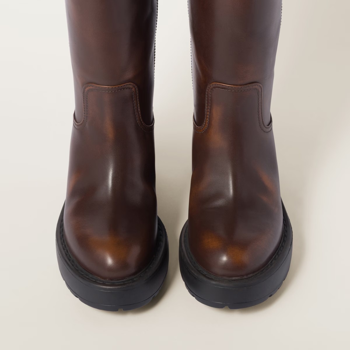 《送料無料》 MIU MIU Smoked leather boots