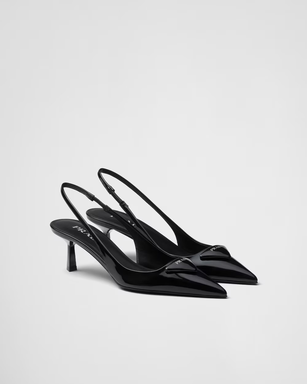 《送料無料》PRADA Patent leather slingback pumps