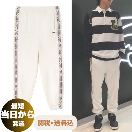 定番のお歳暮&冬ギフトの商品をすべ ホワイト（白）系 LACOSTE(ラコステ) パンツ・ボトムス(メンズ ウォーキング・ランニングウェア
