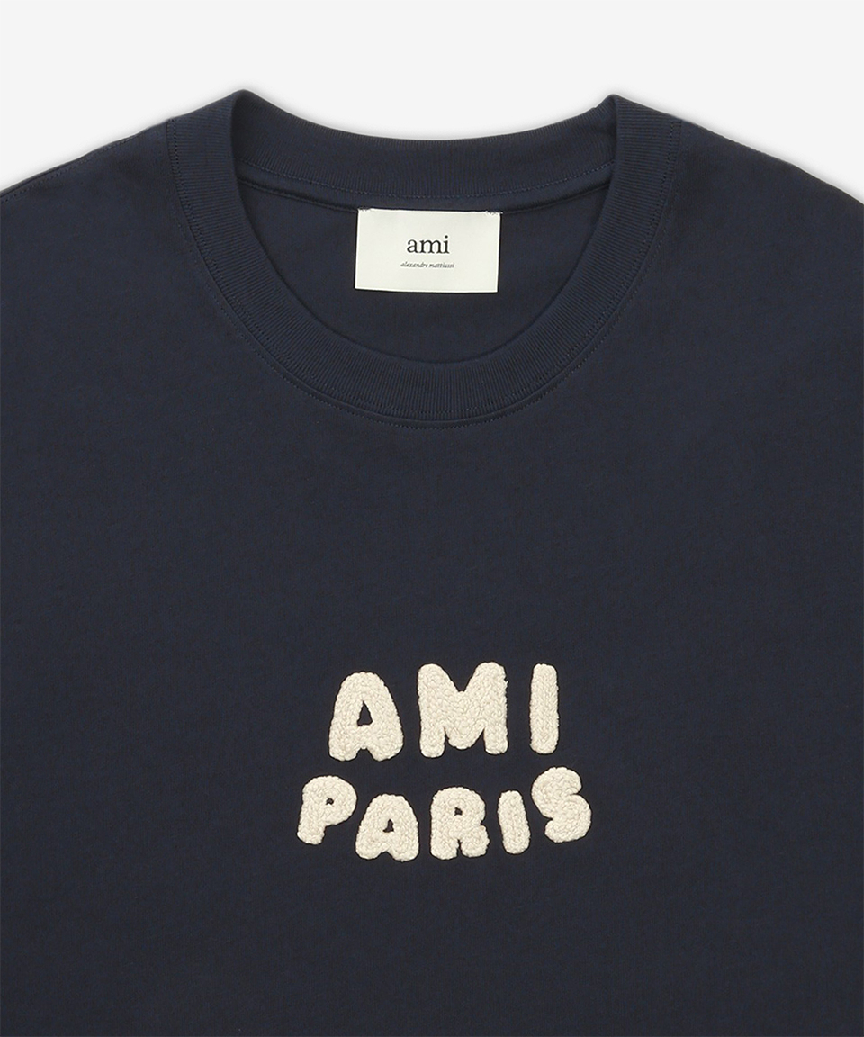 《AMI》 PARIS ロゴ Tシャツ