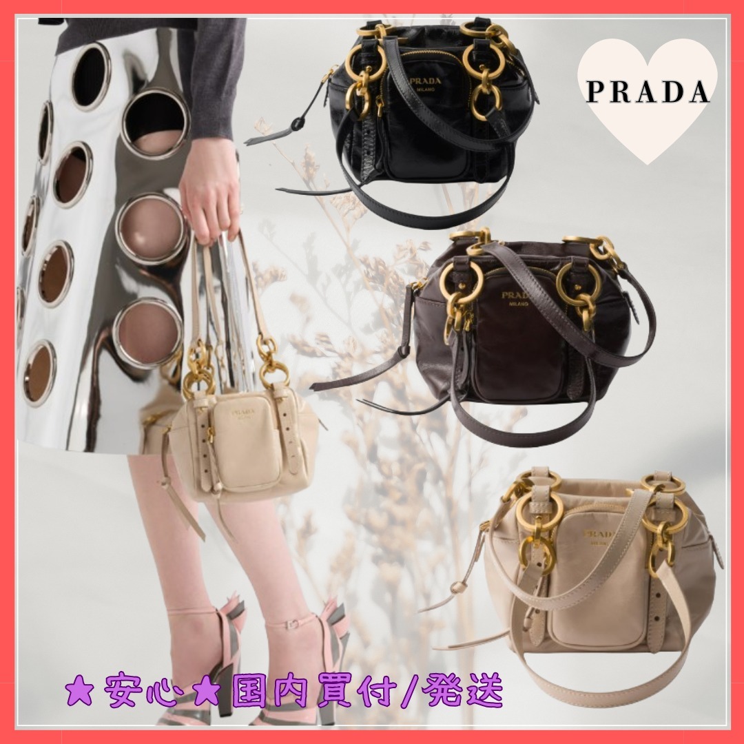 【国内買付】プラダ ダングル レザー トップハンドル ミニバッグ