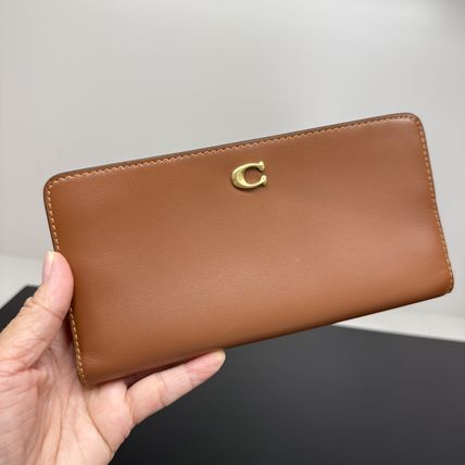 Coach(コーチ) 長財布(レディース) - 海外通販のBUYMA