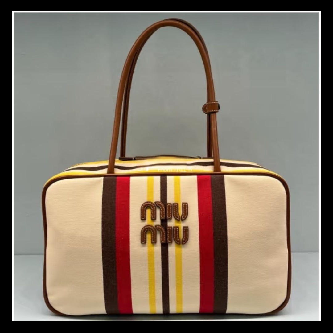 【ｍiuｍiu】ボー キャンバスxレザー バッグ