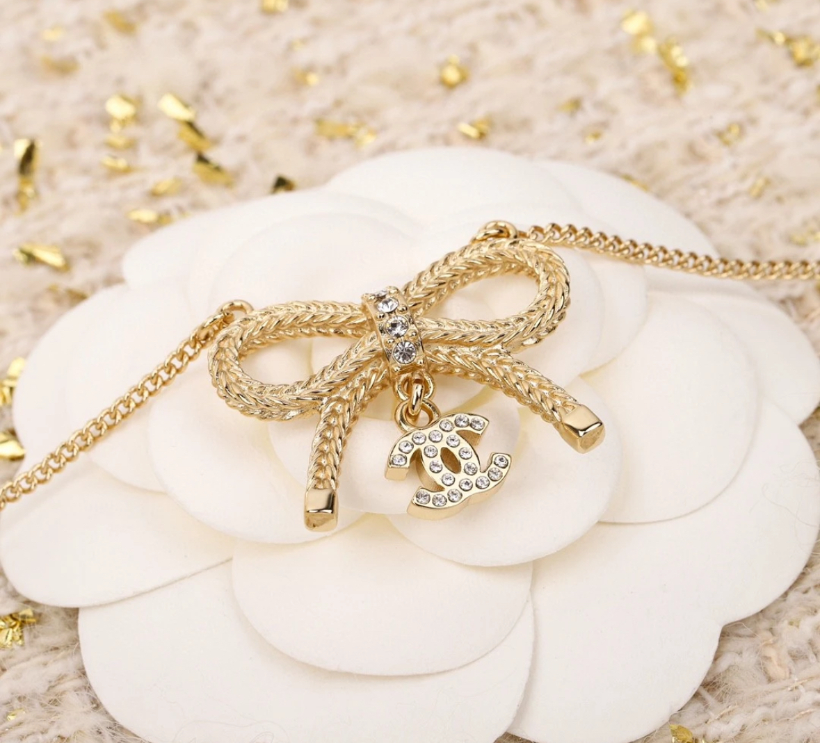 《CHANEL》ゴールド ネックレス CCロゴ リボン プレゼント