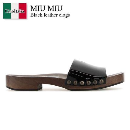 サンダル・ミュール miumiu Sandalo In Pelle Scamosciata 5Z425EZ5OF0003 Miu Miu Black Patent Leather Crystal Embellishment Mule