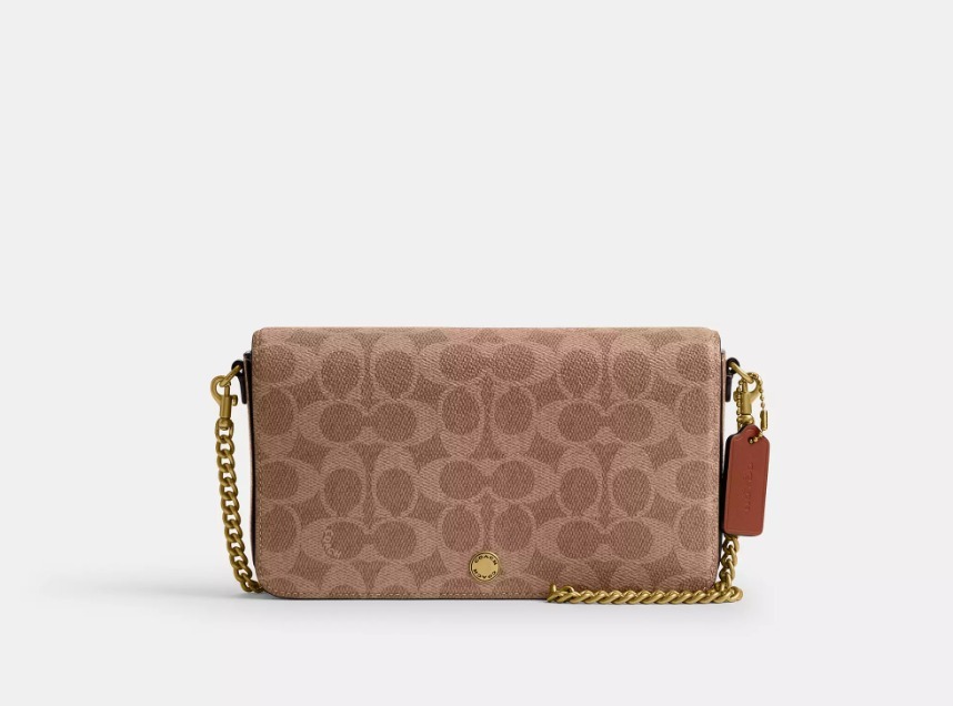 COACH シグネチャーキャンバスのミラ クロスボディバッグ