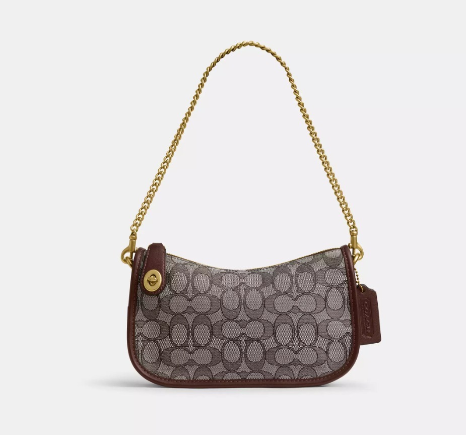 COACH シグネチャージャカードのスウィンガーバッグ