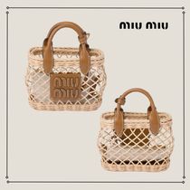 MiuMiu レザートリムの編み込みハンドバッグ