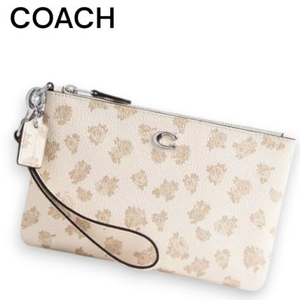 花柄 ホワイト（白）系 Coach(コーチ) ポーチ(レディース