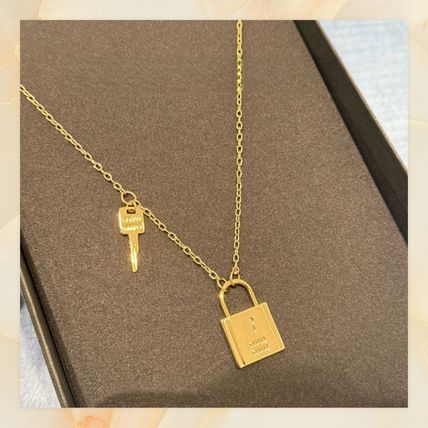 【miumiu】メタル ネックレス ロック＆キー MiuMiu】ミュウミュウ ロゴ クリスタル付 メタル ネックレス