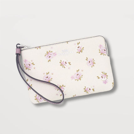花柄 ホワイト（白）系 Coach(コーチ) ポーチ(レディース