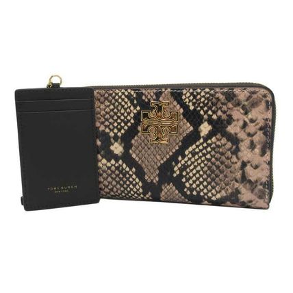 パイソン 財布 Tory Burch(トリーバーチ) - 海外通販のBUYMA